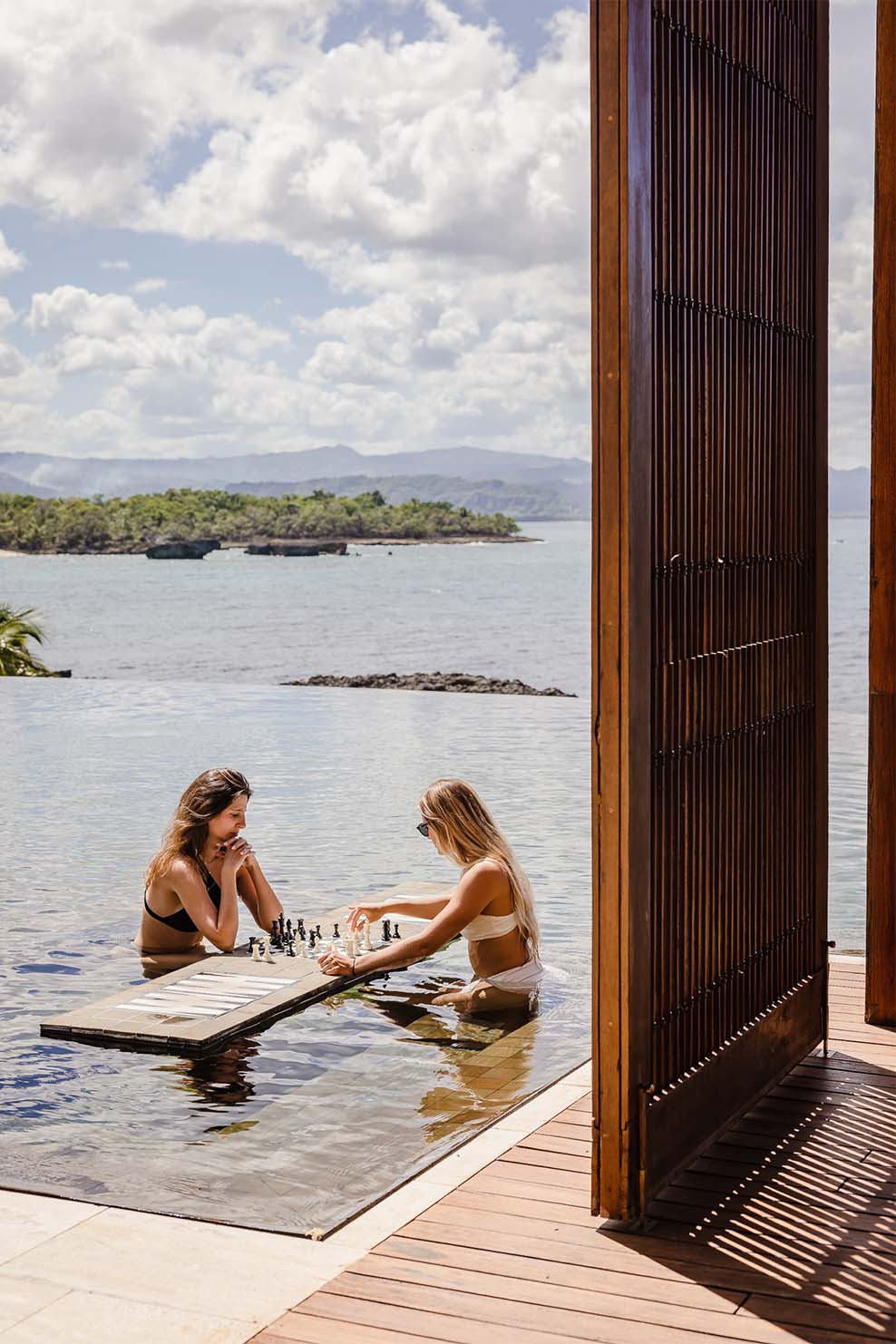 ani dominican republic resort villa amber pool chess with guests 2