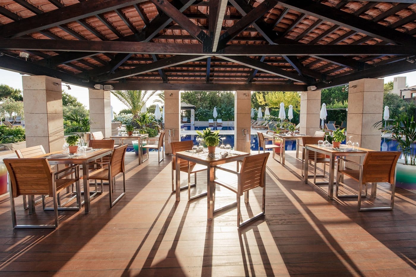 the romanos outdoor pool dining area