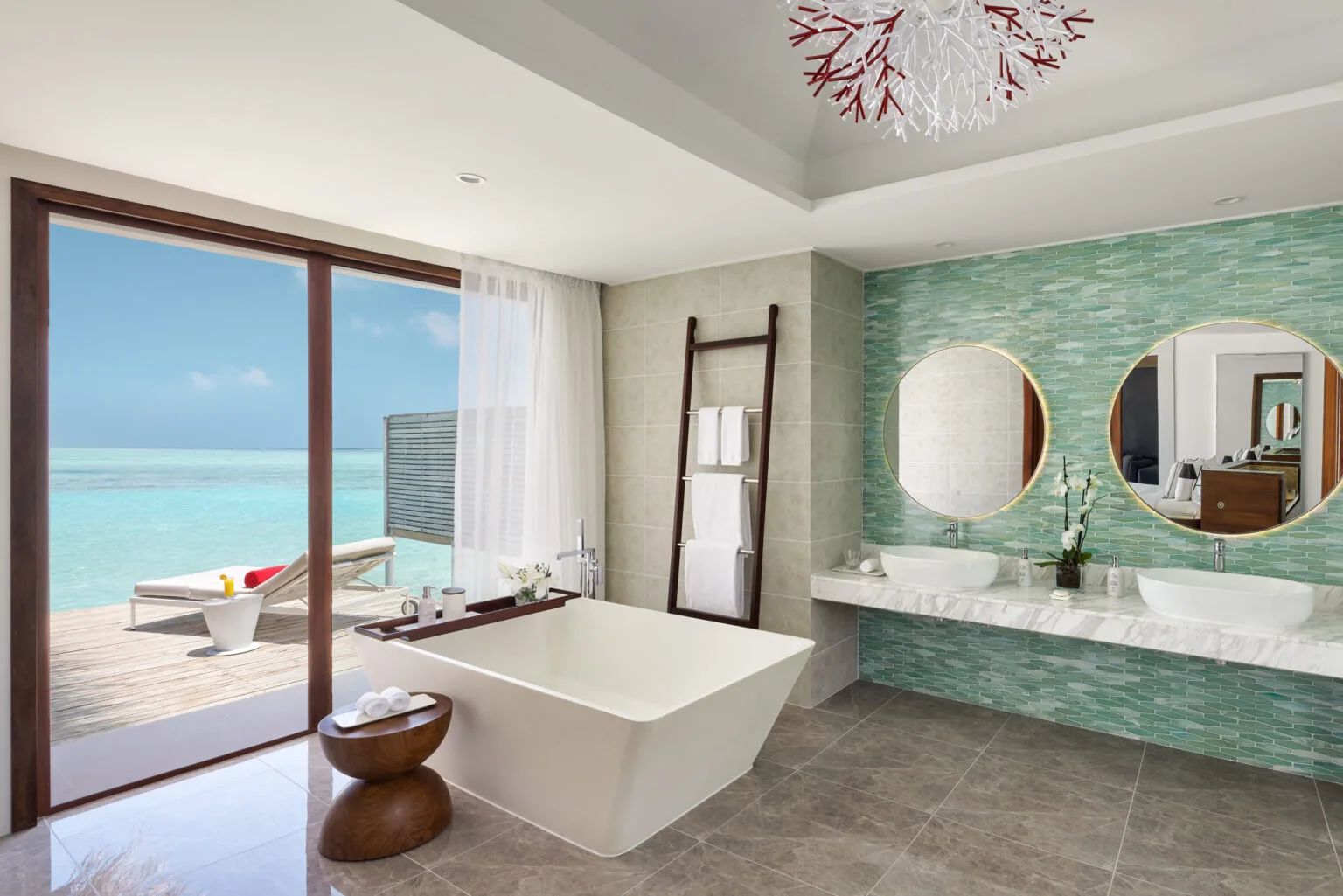niyama private islands over pool villa bathroom