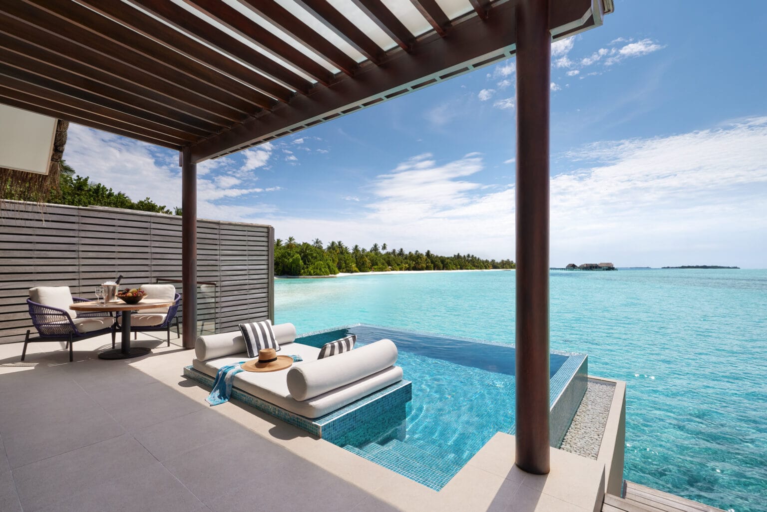 niyama private islands over pool villa deck overlooking indian ocean