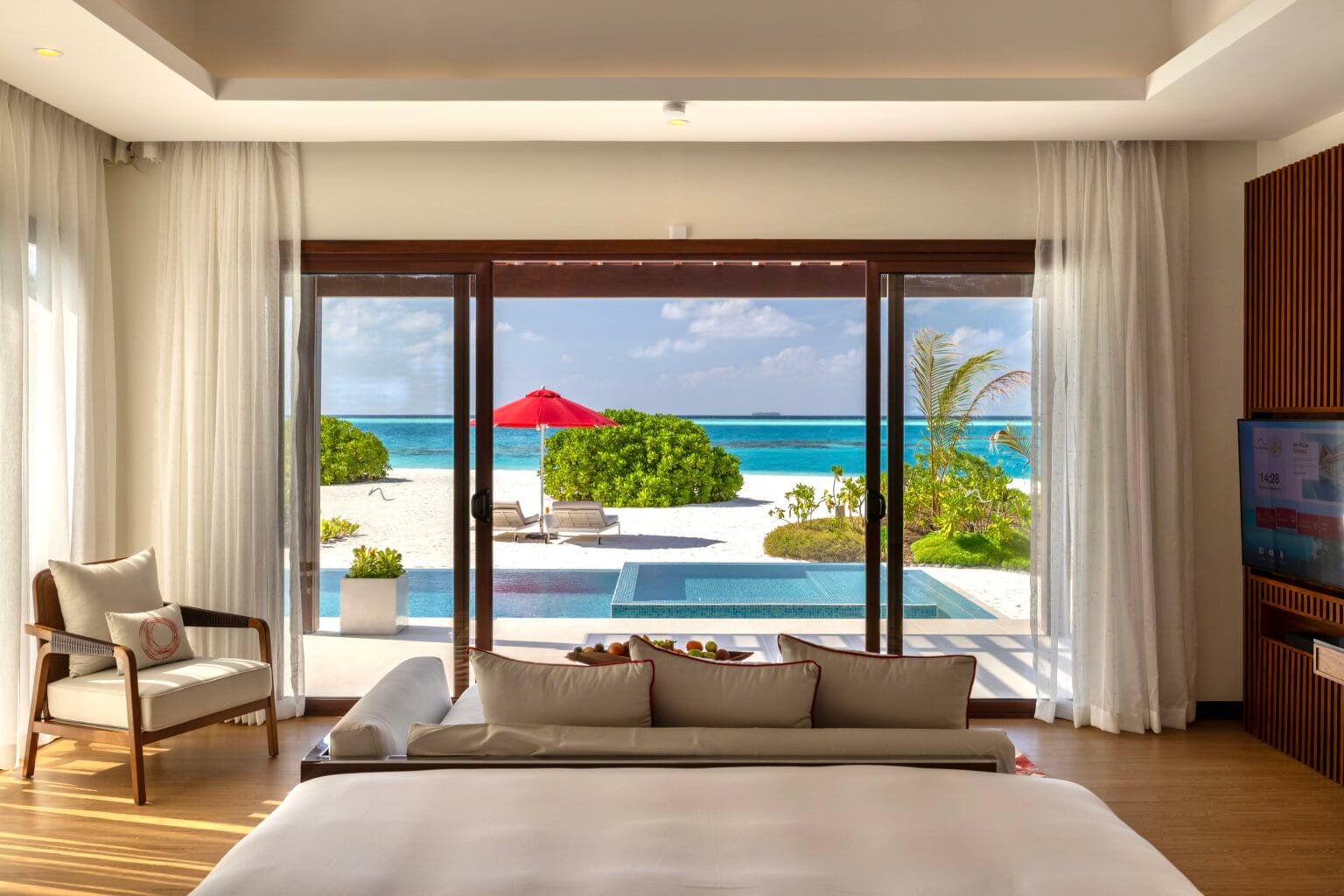 niyama private islands maldives guest room one bedroom beach pool pavilion bedroom interior
