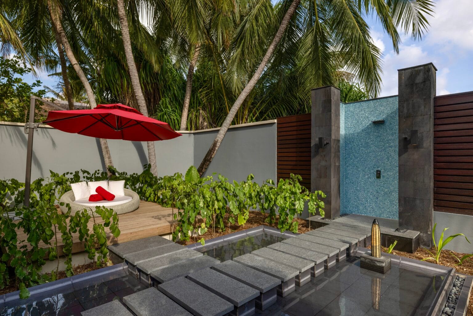 niyama private islands maldives one bedroom beach pool pavilion outdoor shower