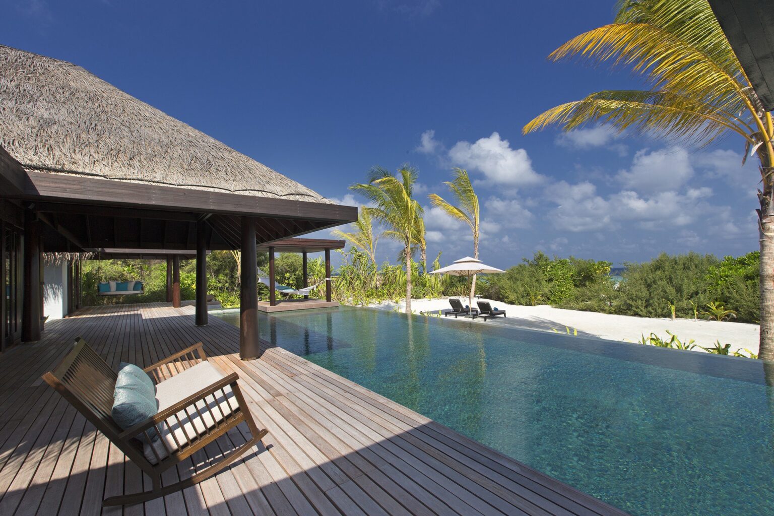61615735-H1-Three_Bedroom_Beach_Pool_Residence__pool_and_deck.jpg