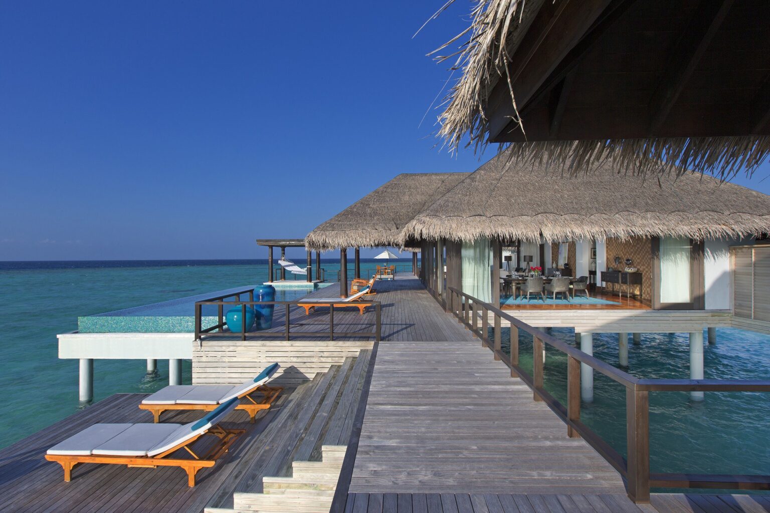 61616738-H1-Two_Bedroom_Over_Water_Pool_Residence_deck_and_pool.jpg