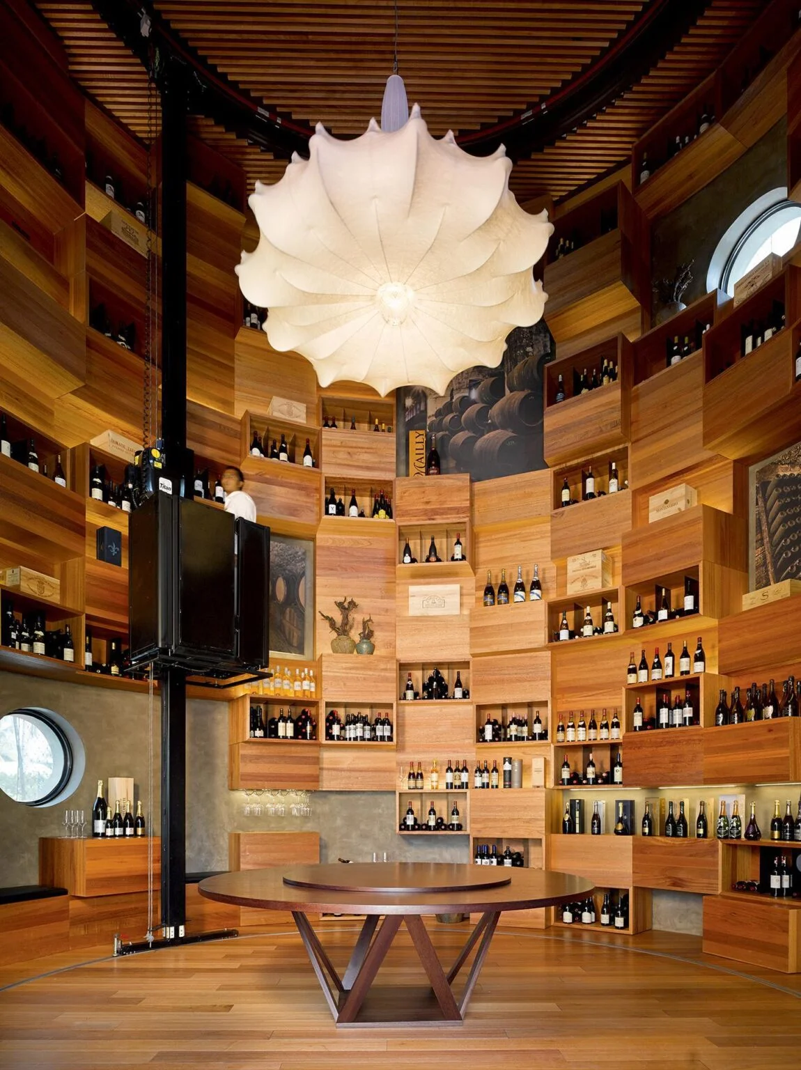 wine bar with shelves to the ceiling