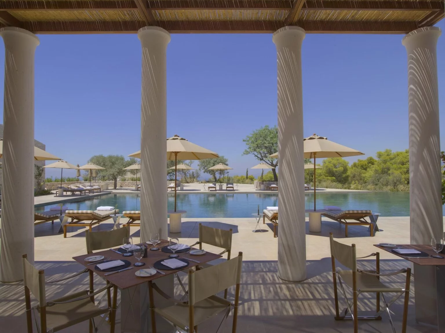 view from the terrace of the Amanzoe hotel pool