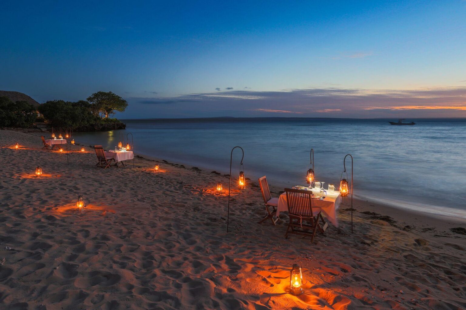 Azura-Quilalea-dining-on-beach.jpg