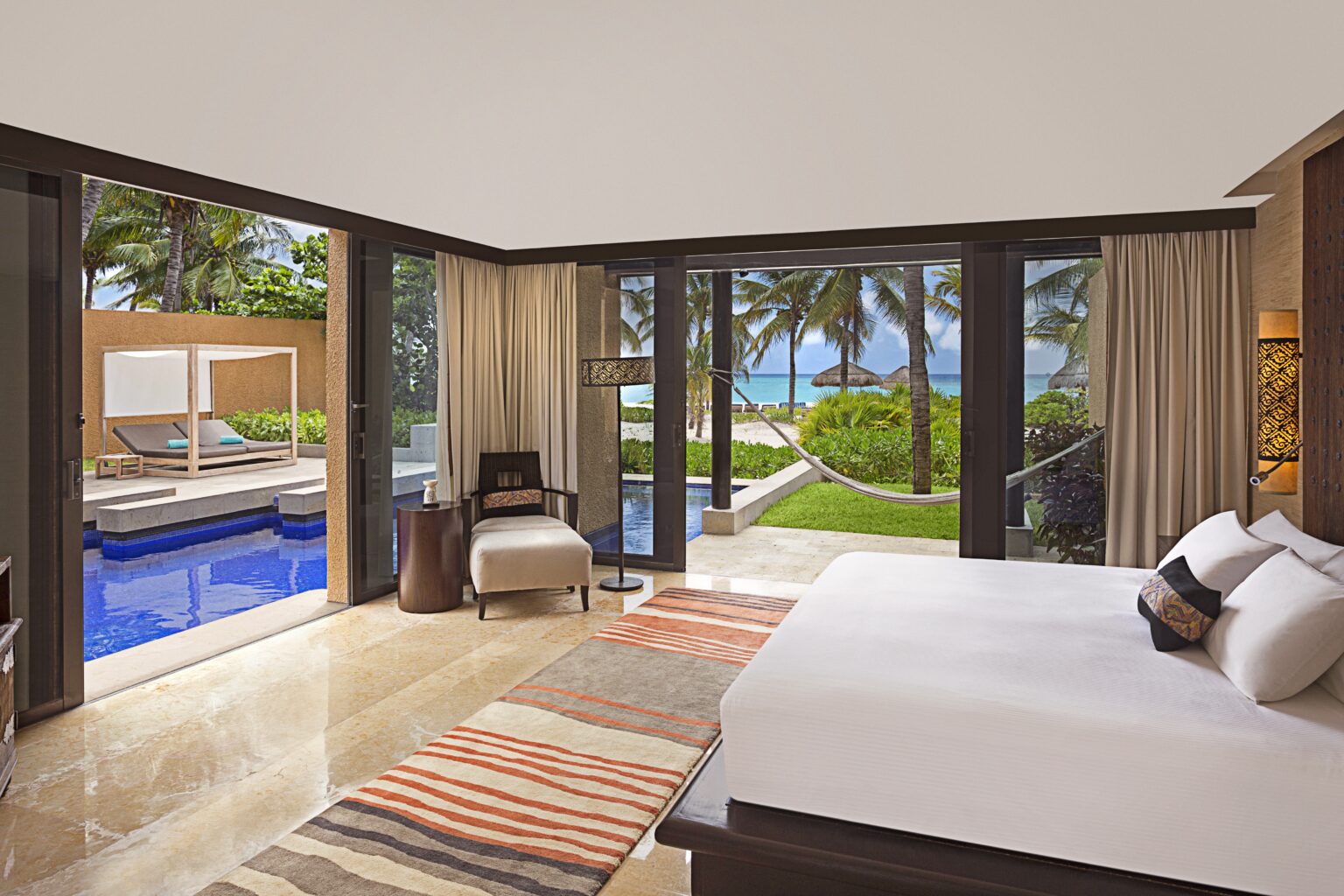 BTMXMY-Beachfront-Three-Bedroom-Pool-Villa-Master-Bedroom-High-Res.jpg