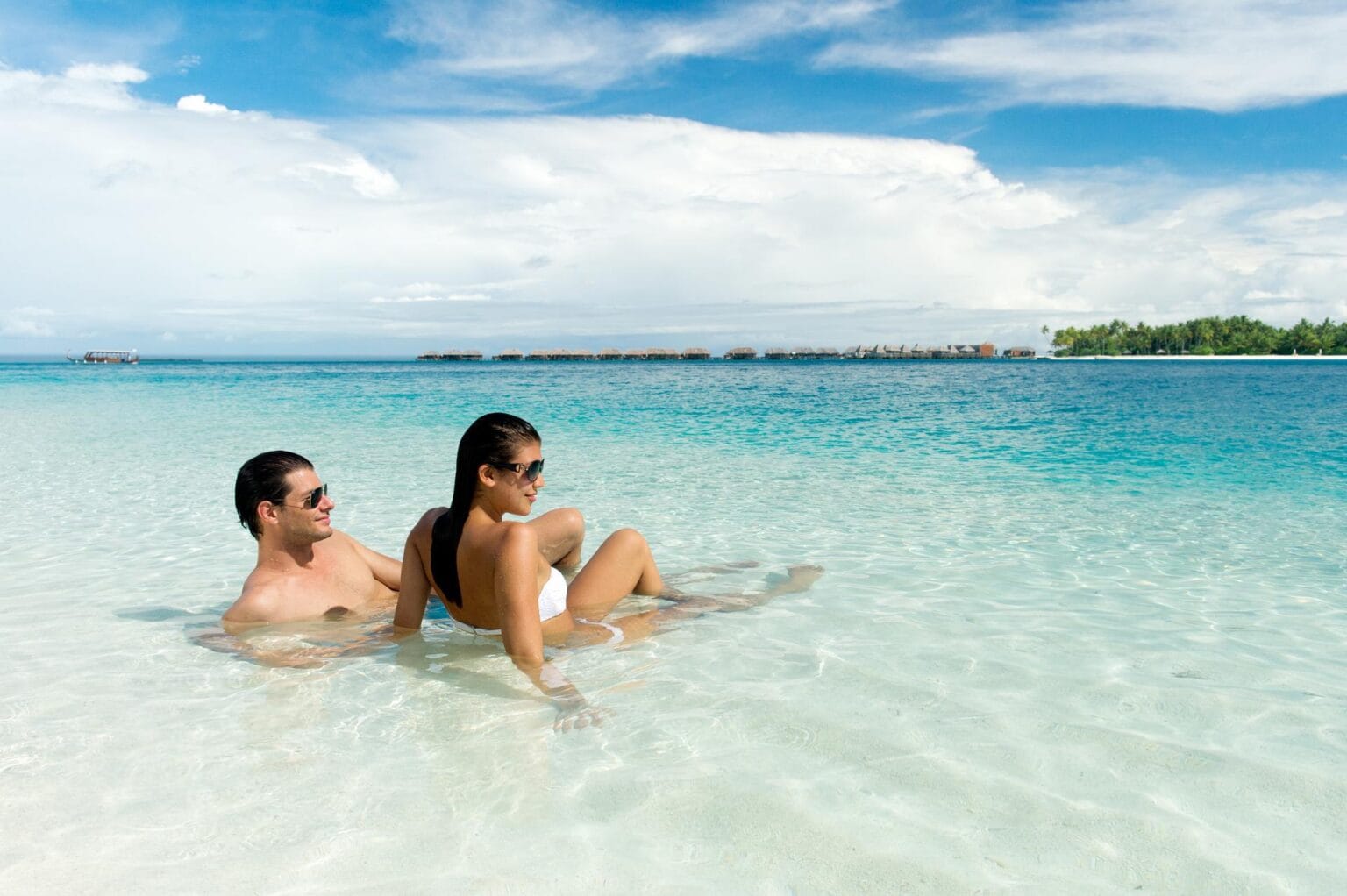 Conrad_Maldives_beach_with_models_8_HR.jpg