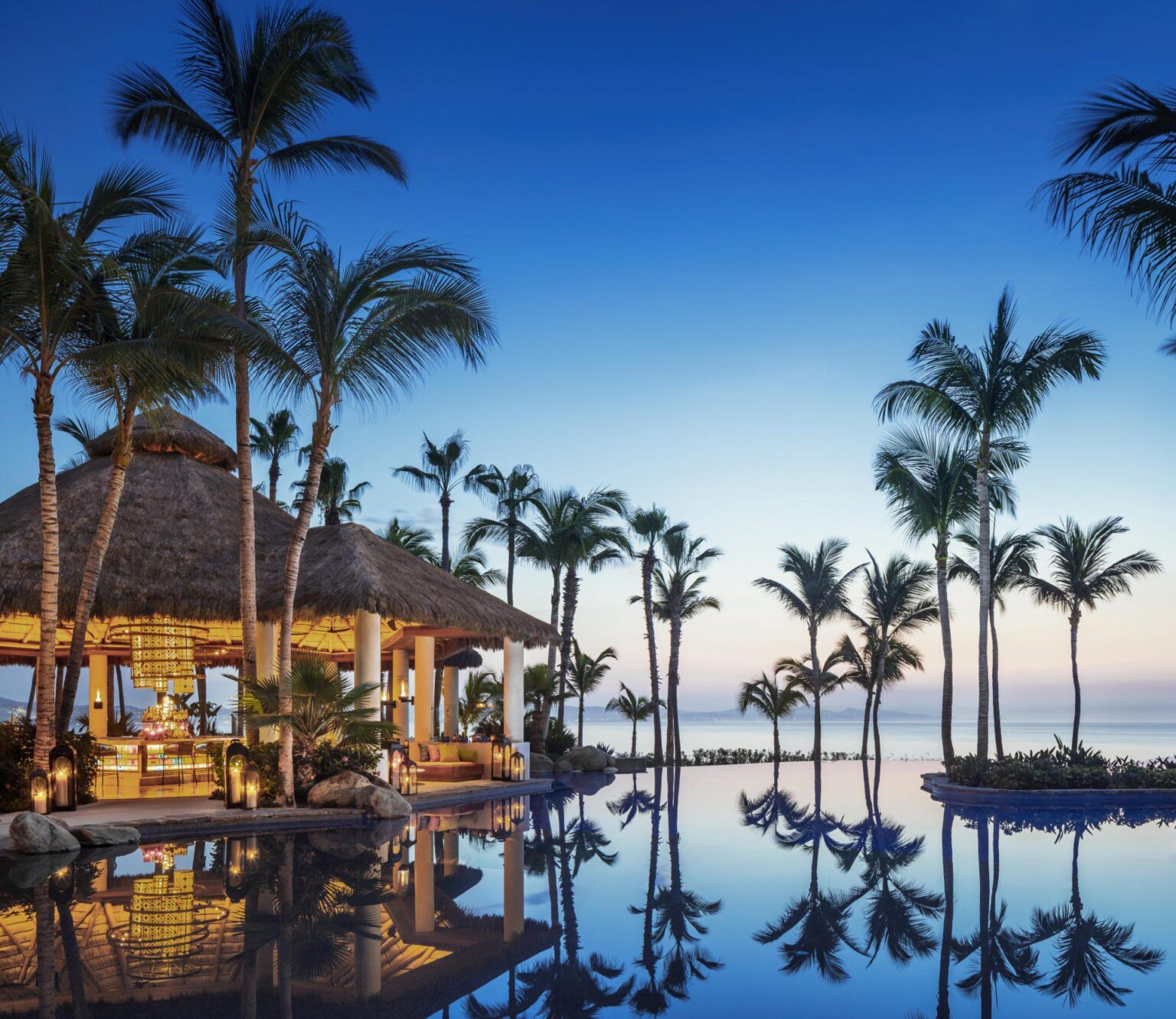 OO_Palmilla_FB_Agua_Bar_Exterior_Night_0616_MASTER_PORTRAIT.jpg