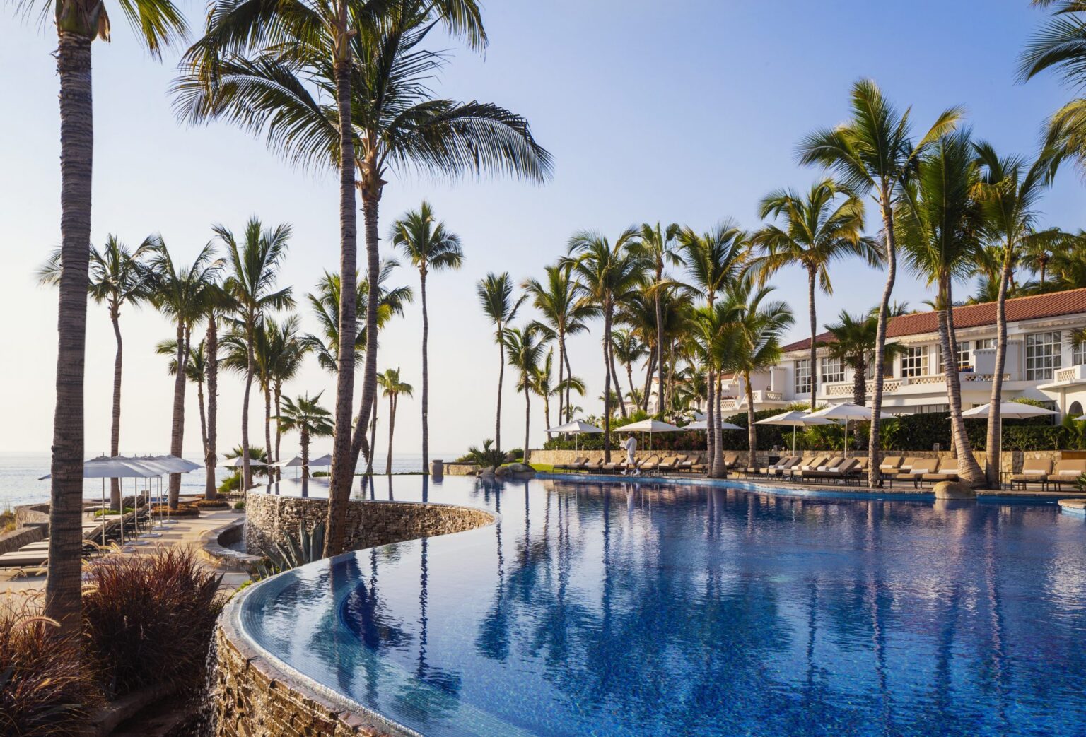 OO_Palmilla_PoolBeach_Family_Pool_Waterfall_0682_MASTER.jpg