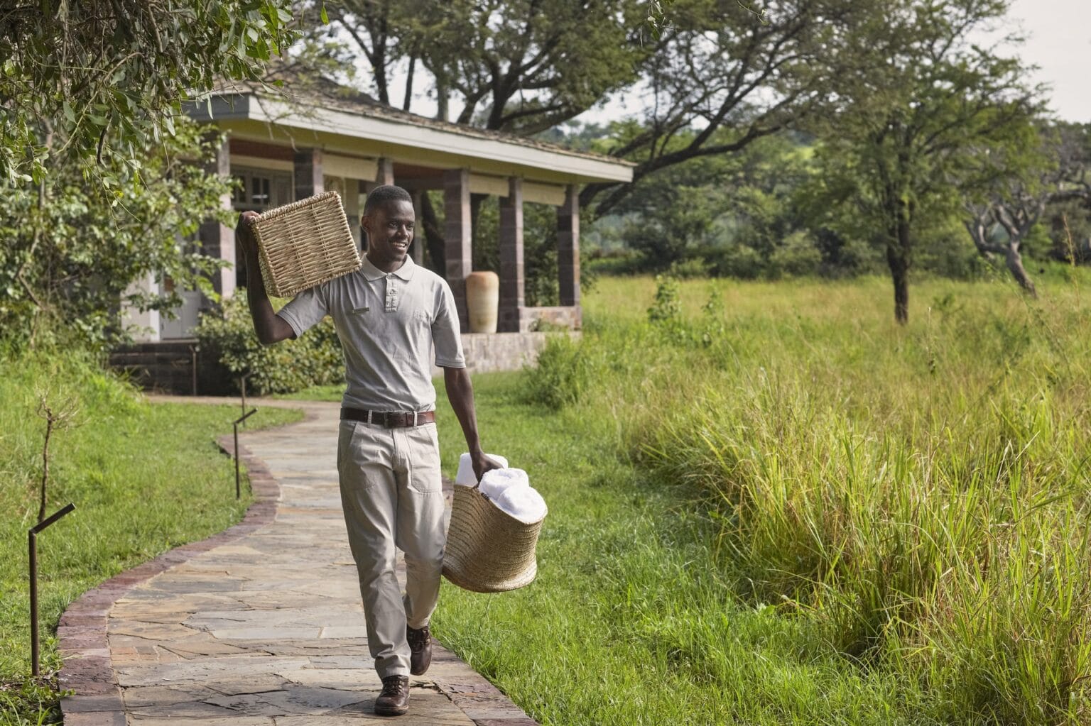 Singita-Serengeti-House-Staff-with-Laundry.jpg