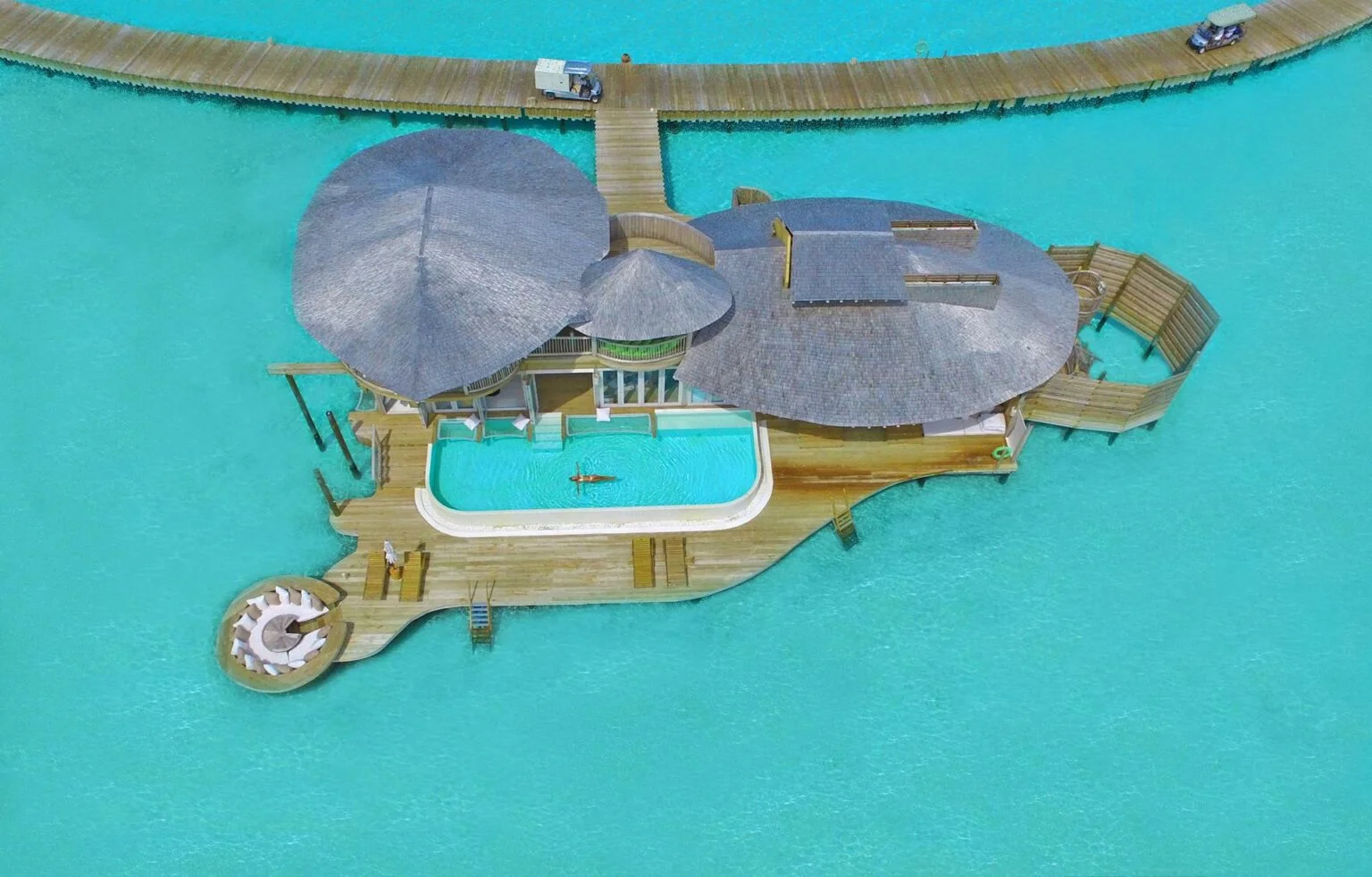 Aerial view of lagoon cottages in the Maldives
