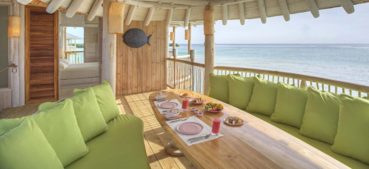 dining area on the terrace overlooking the lagoon