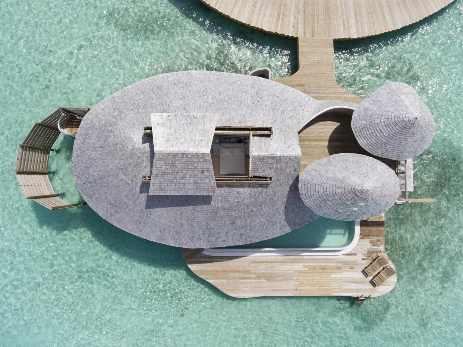 Aerial view of lagoon cottages in the Maldives