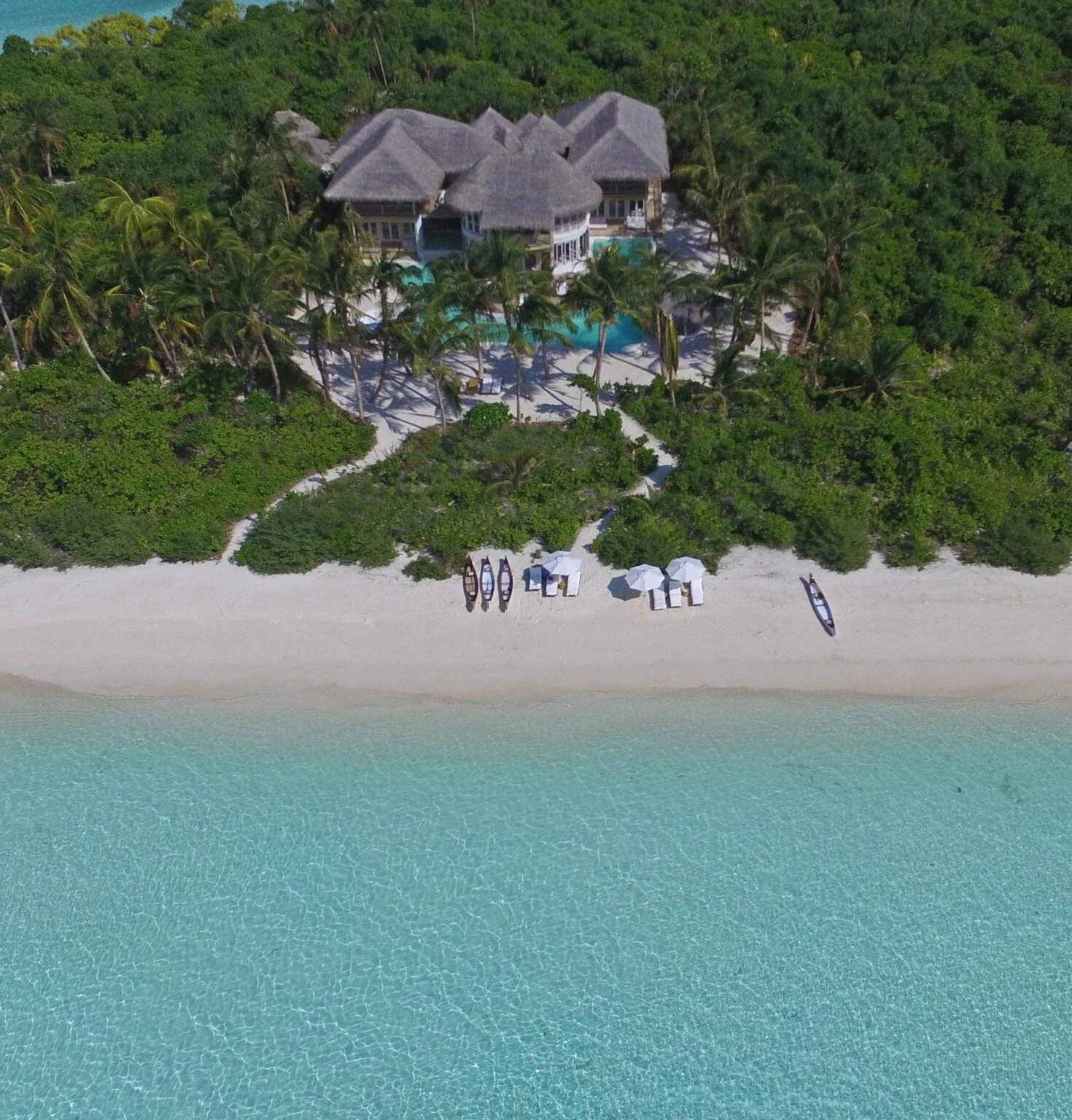 Aerial view of lagoon cottages in the Maldives