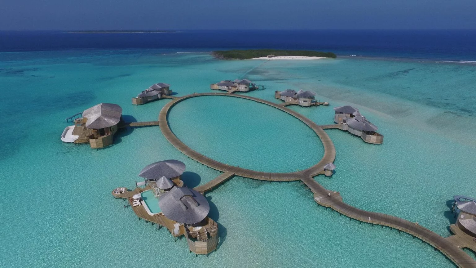 Aerial view of lagoon cottages in the Maldives