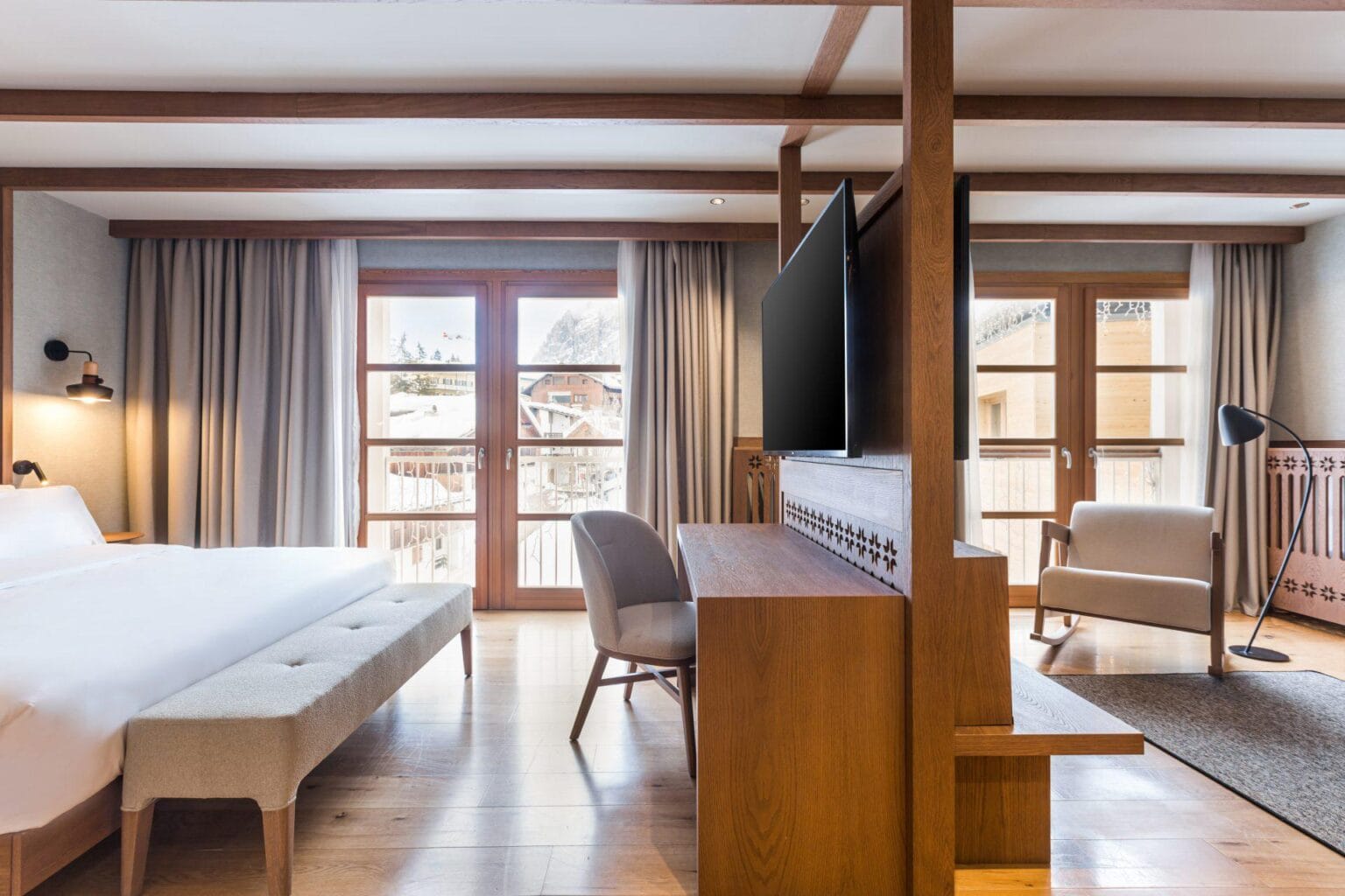 Suite-Dolomites-bedroom-and-lounge-split.jpg