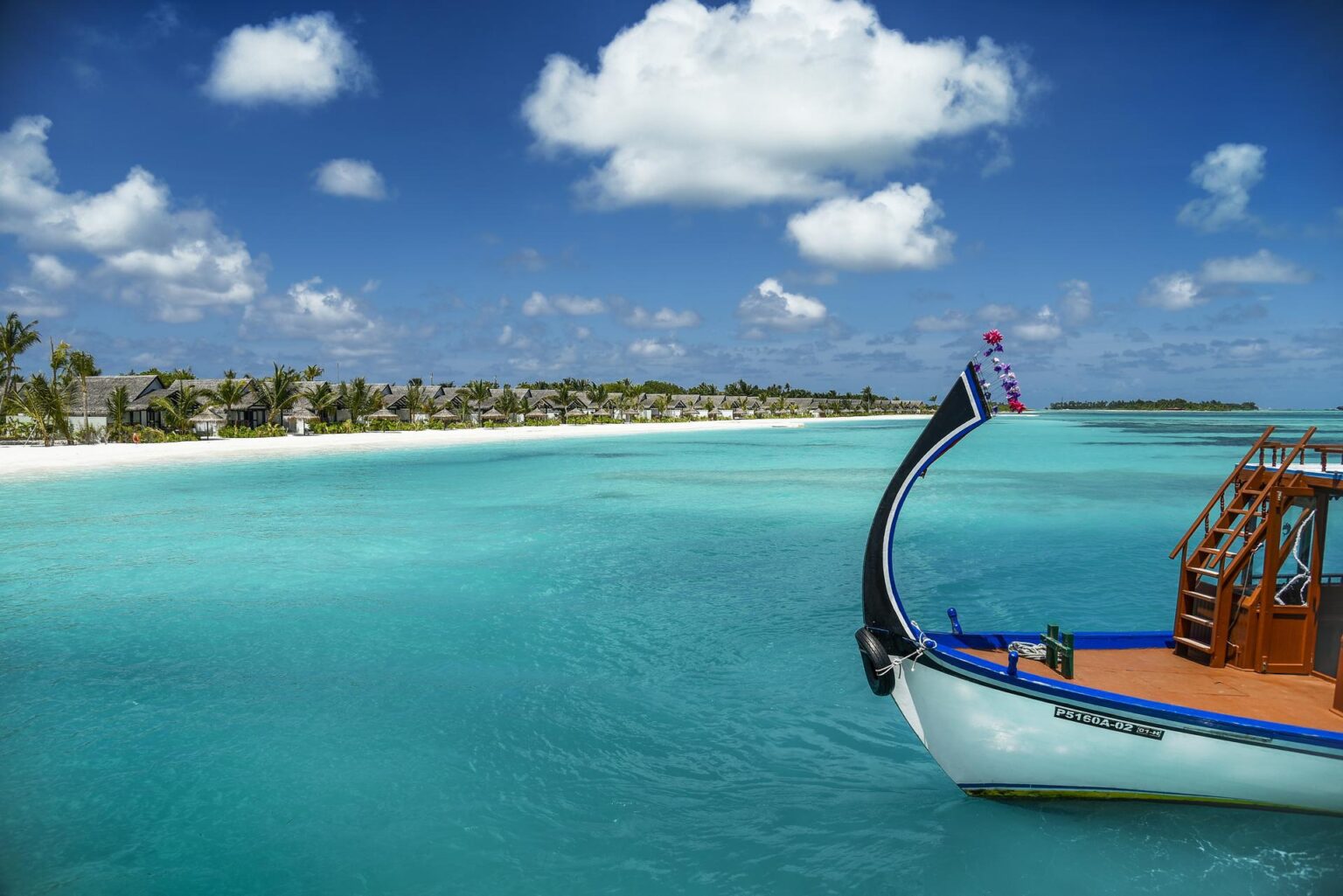 Traditional-Dhoni-in-Lagoon-with-View-of-Island.jpg