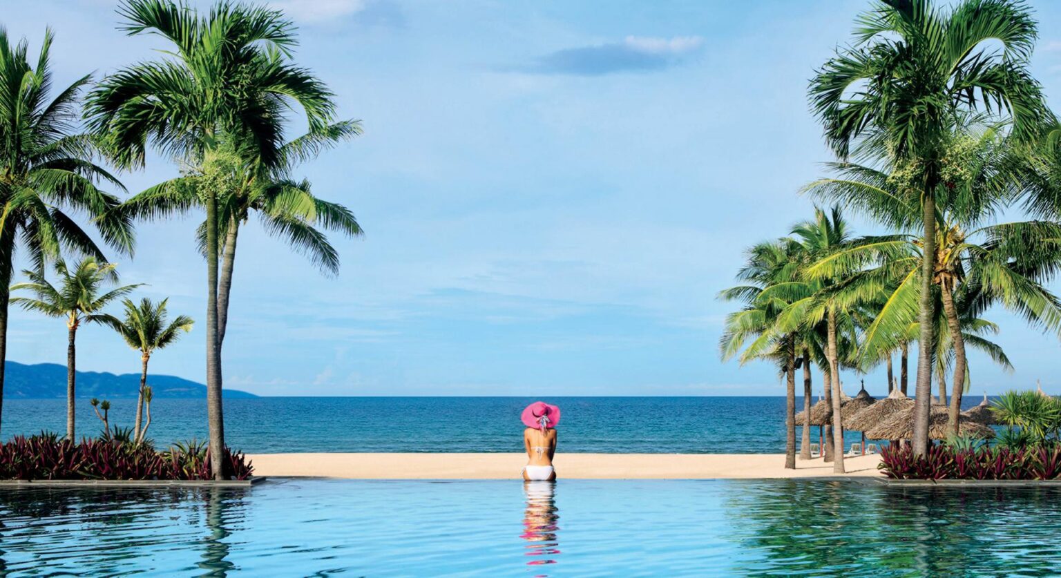 Vietnam_Danang_Furama_Resort_Exterior-Furama-girl-with-pink-hat.jpg