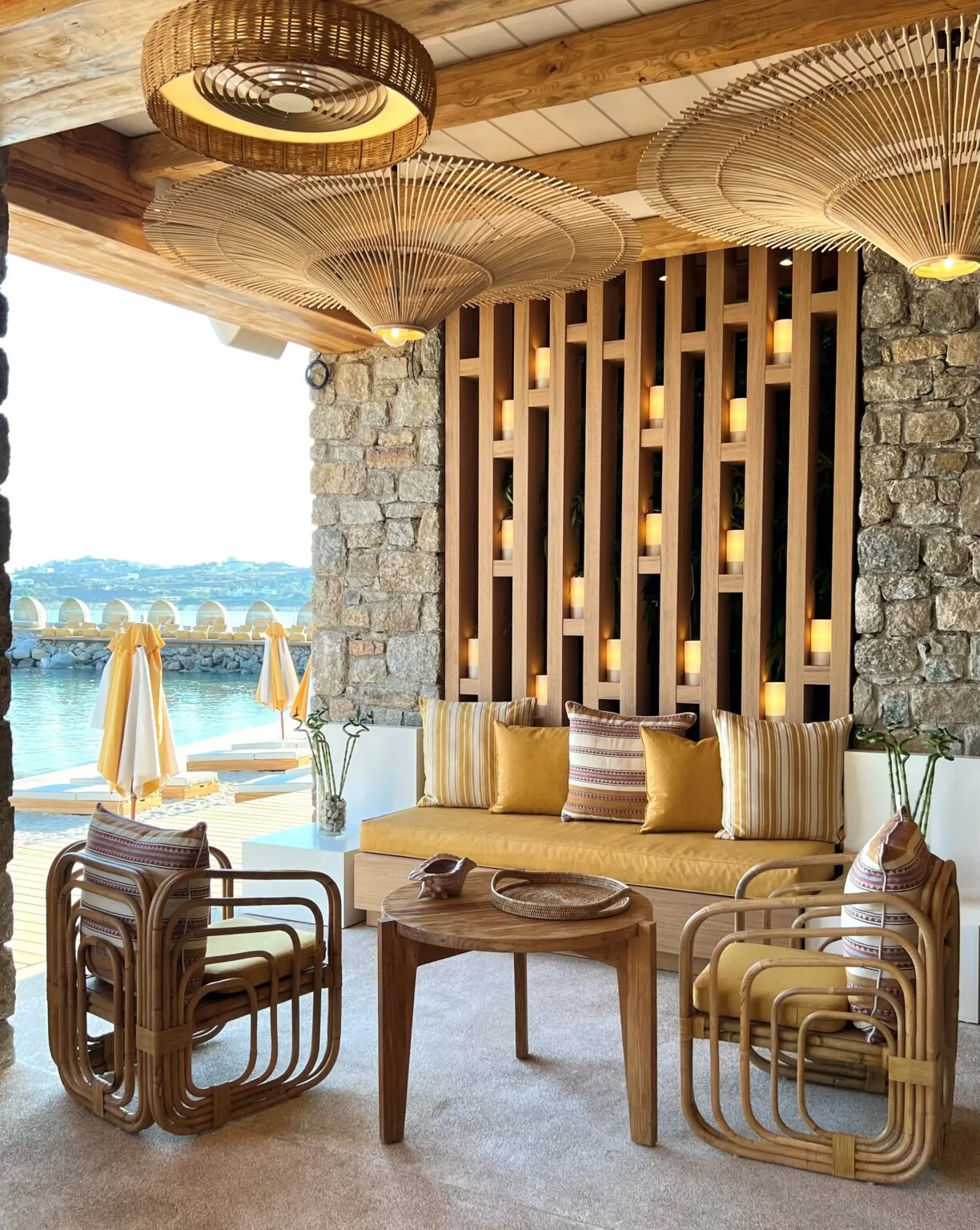 outdoor terrace with tables and armchairs