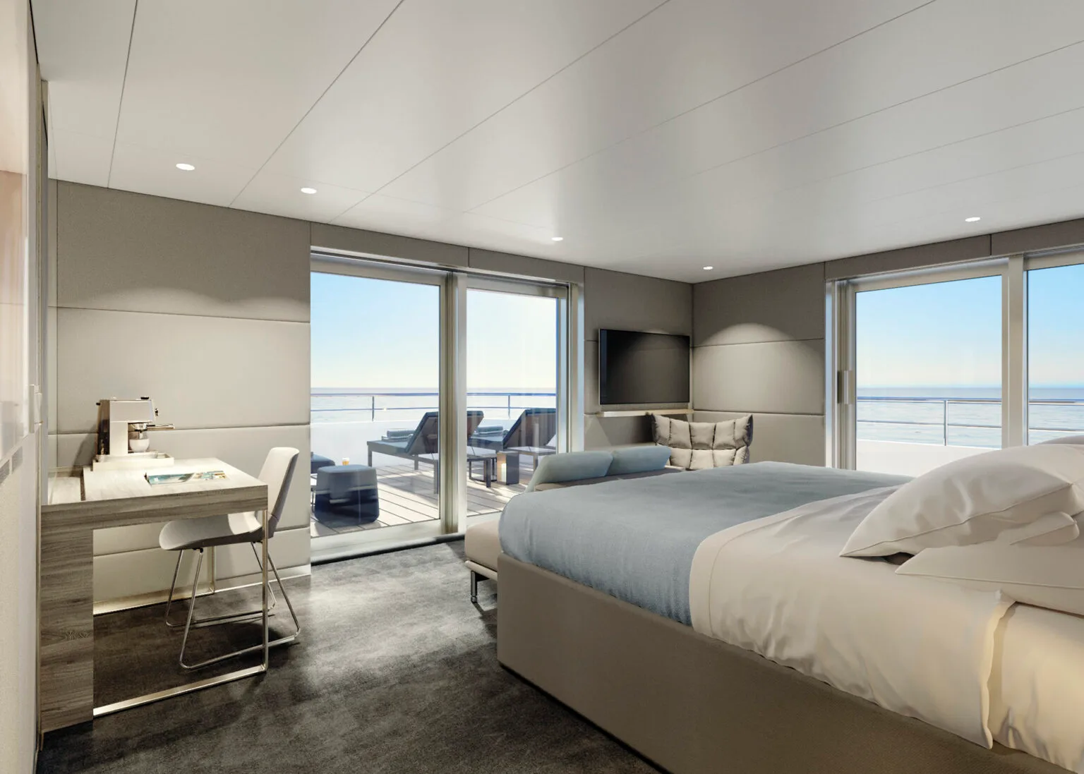 Зразковий номер в Emerald Cruises, в бежево-коричневих тонах, робочий стіл, ліжко з телевізором, великі просторі вікна з видом