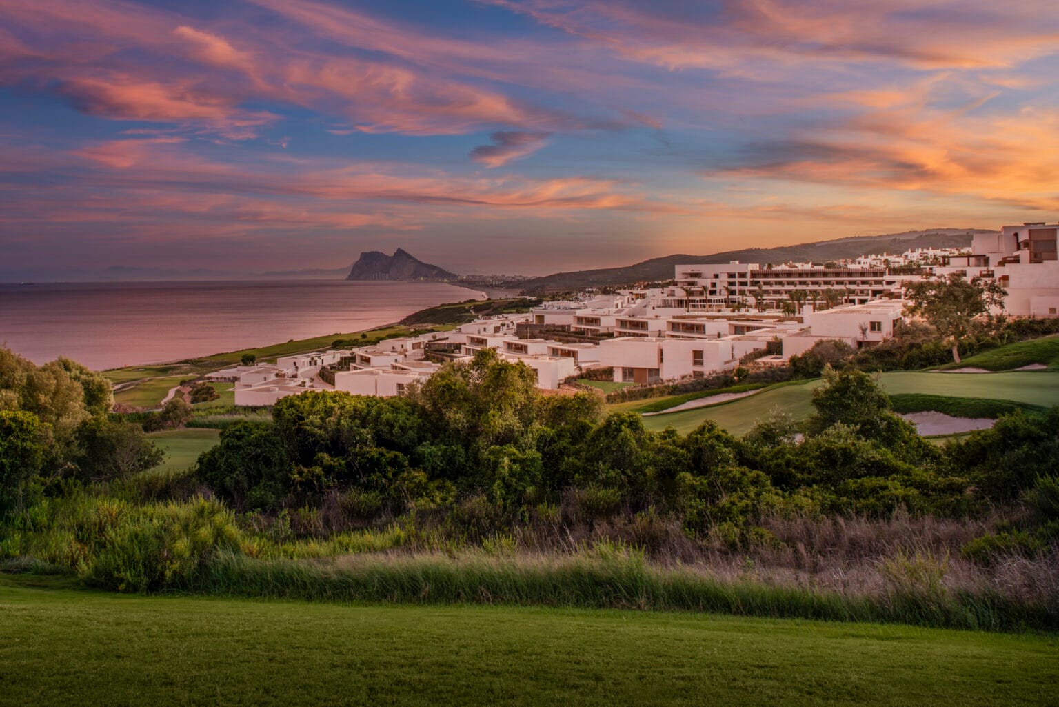 Fairmont La Hacienda Hotel golf course and view to Gibraltar, La Alcaidesa, Andalucia. Spain