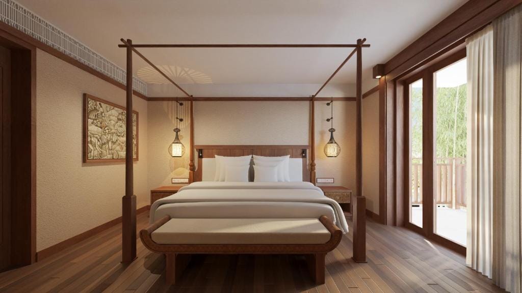 paradisus by meliá bali sypialnia w drewnianych sklepieniach oraz jasnych kolorach beżu i brązu