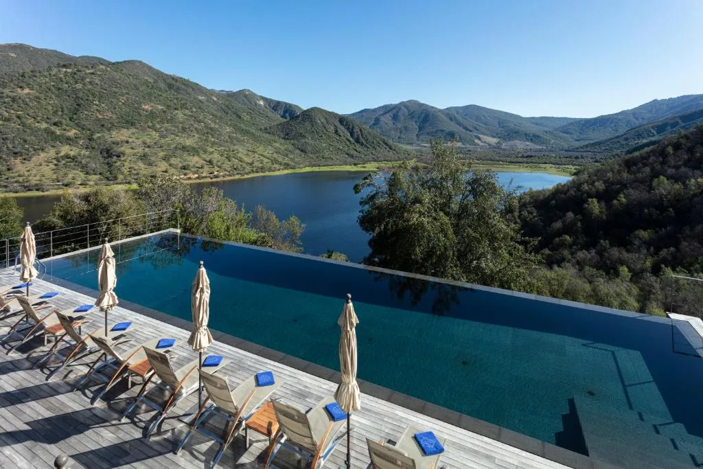 vik chile outdoor pool with water view