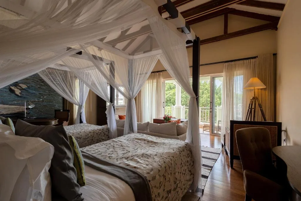 hemingways nairobi kenya bedroom two separate beds with nature view