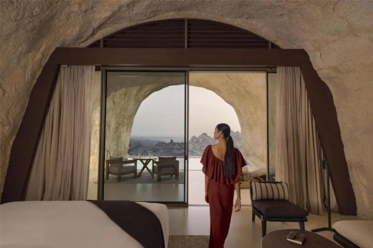 Desert Rock Resort woman walking around suite