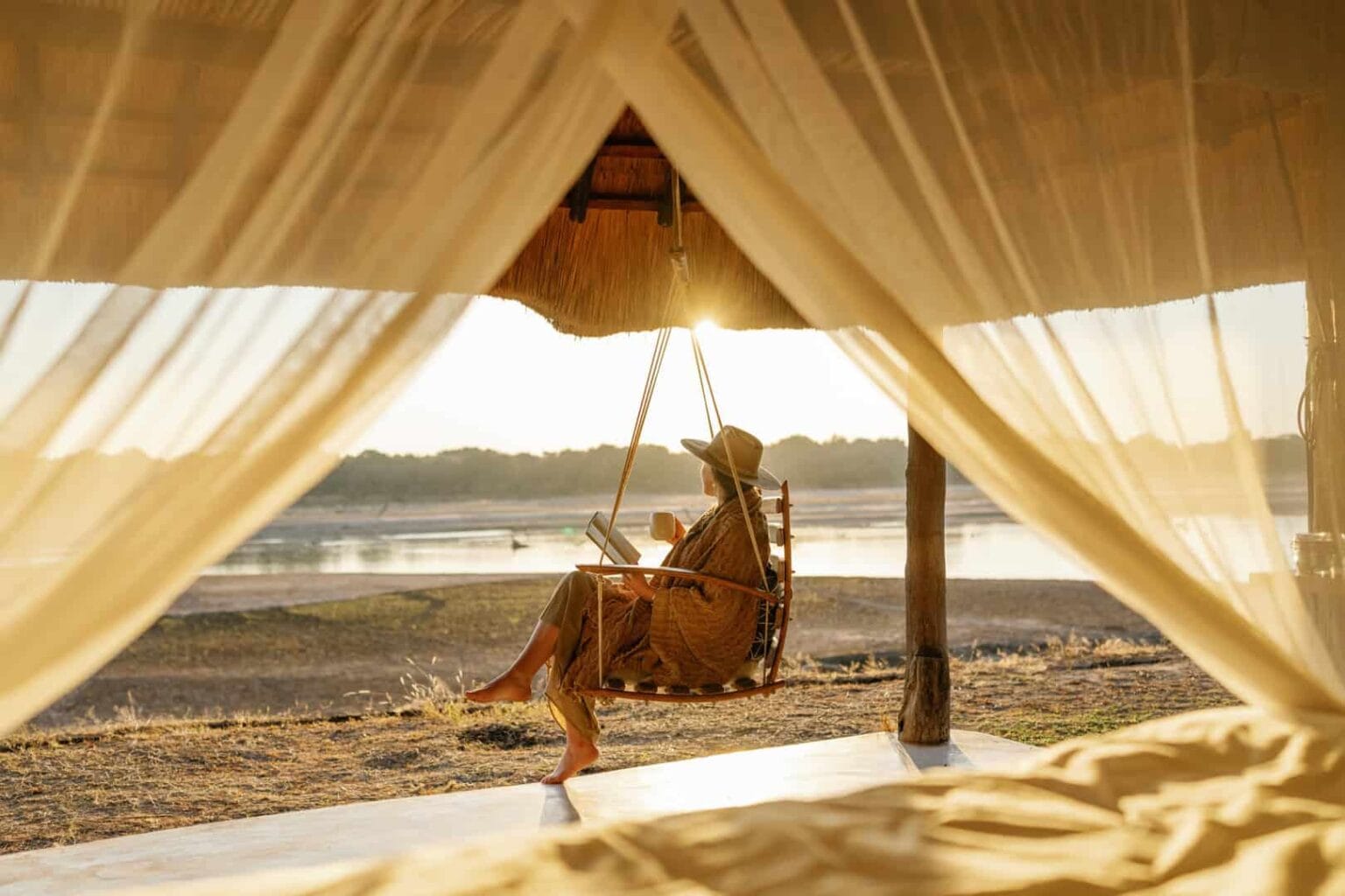 room kakuli © oliver fly photography 47 - woman resting on a swing
