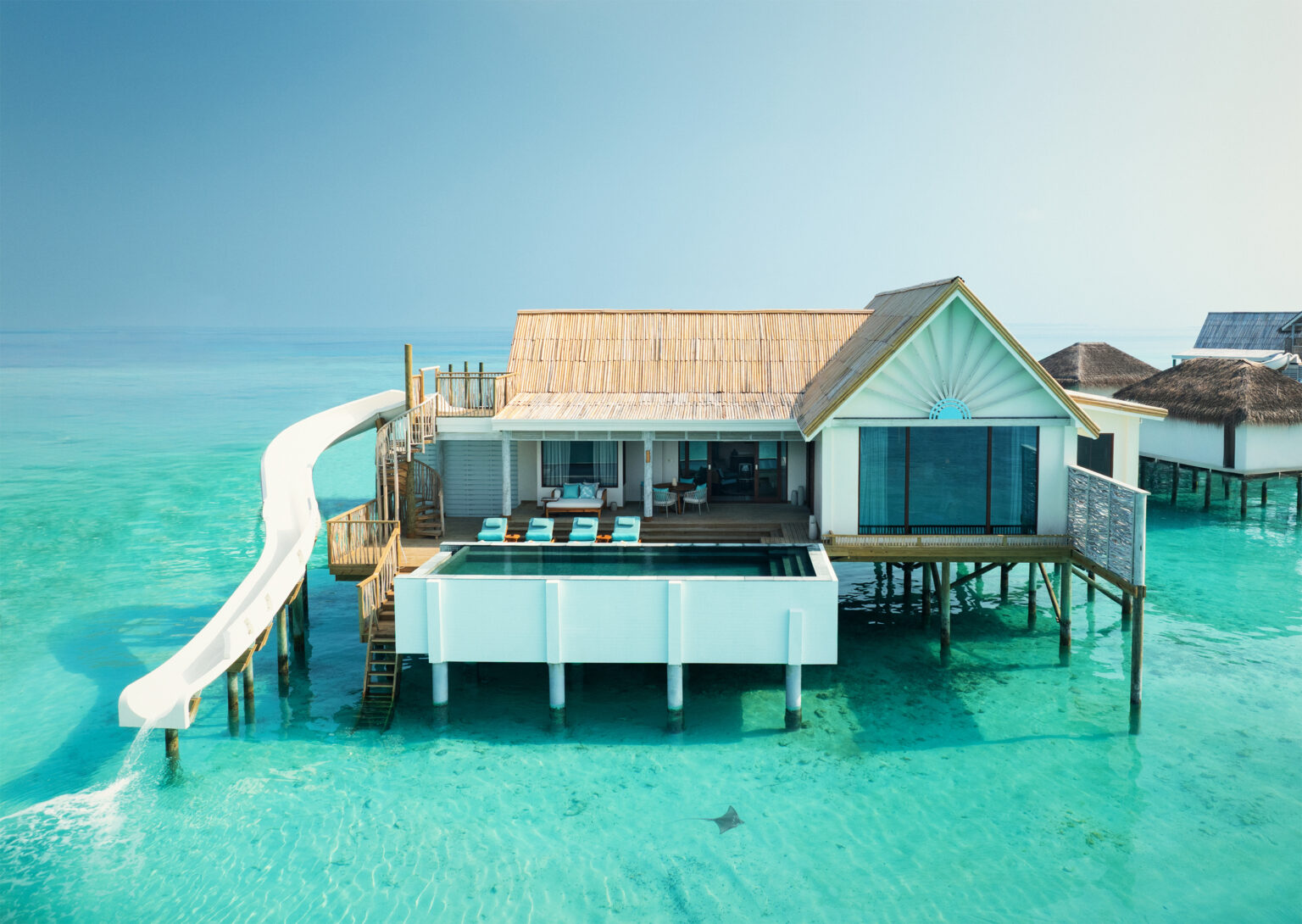 rah gili maldives sunset water pool villa (2br) drone