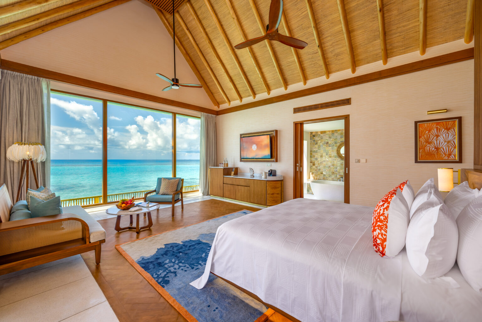 rah gili maldives water pool villa with slide interior